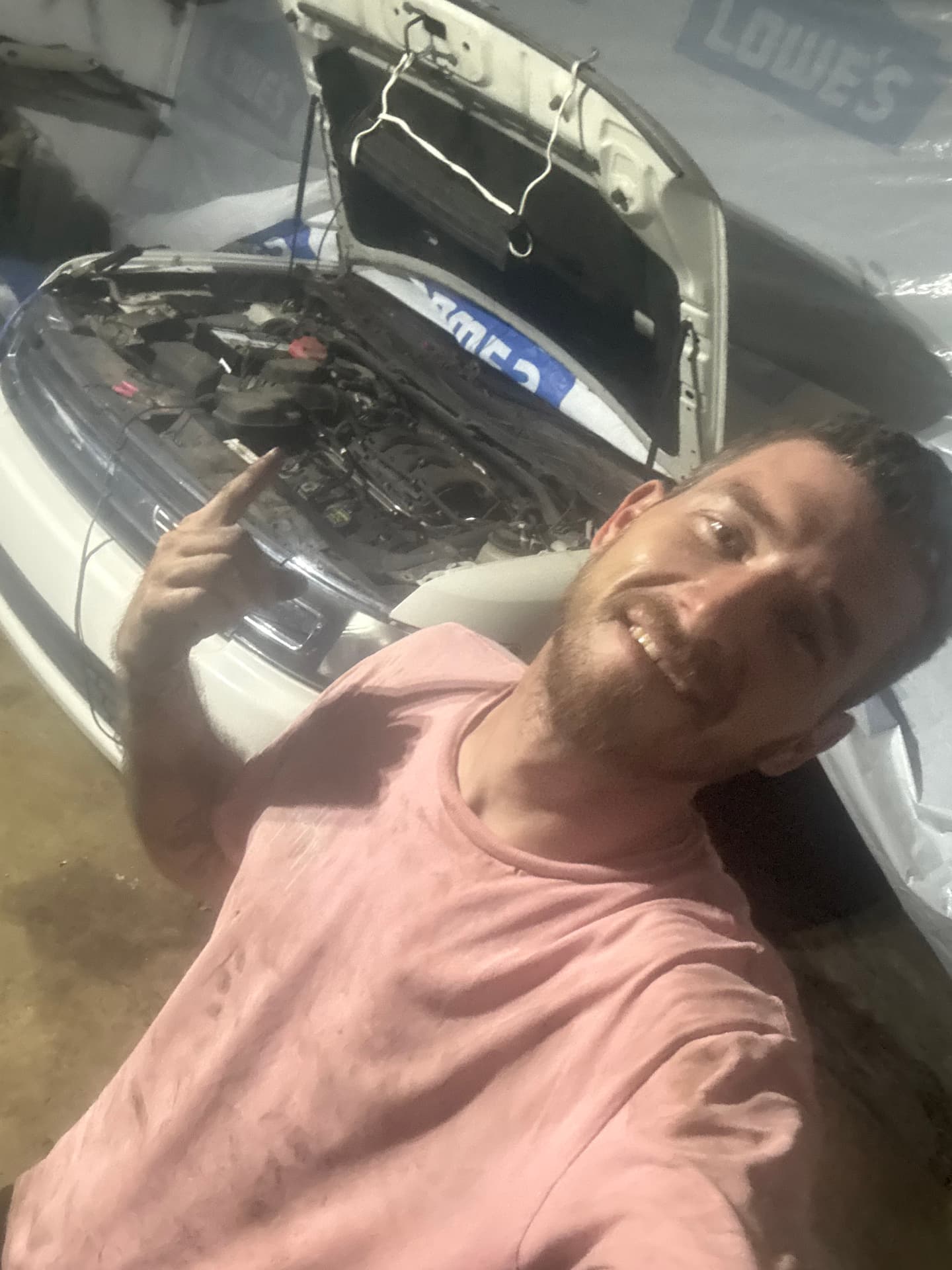 Blake, owner of Sam's Auto, working on a car in Douglas, Georgia