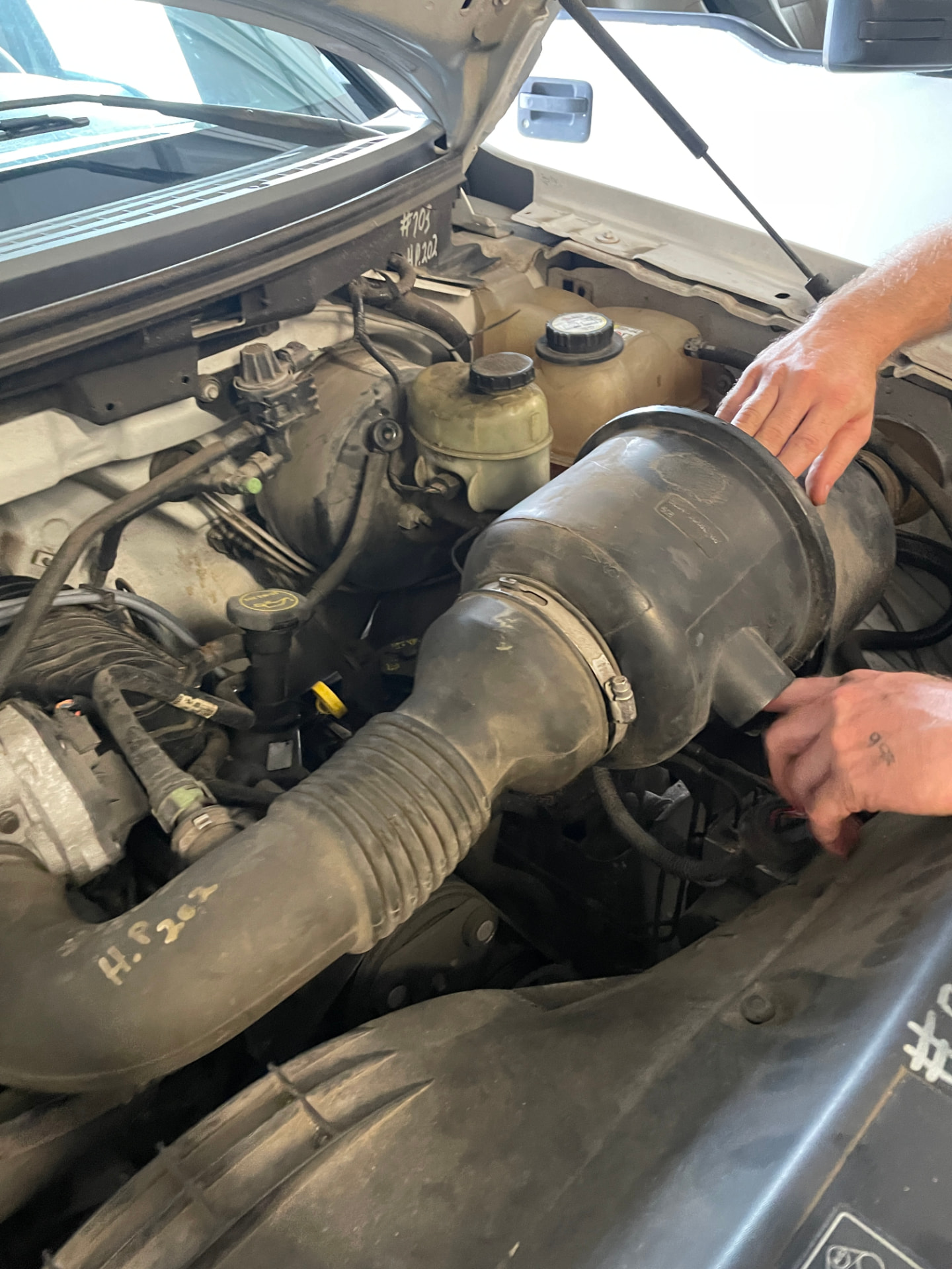 Air intake service — Airbox and tube pulled, Sam's Auto mobile mechanic in Douglas, GA