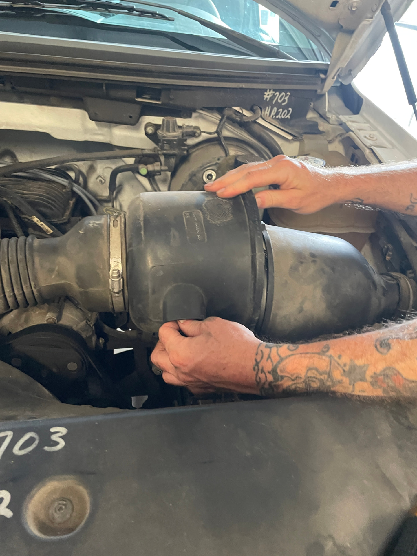 Intake housing out — Hands-on airbox removal, Sam's Auto mobile mechanic in Douglas, GA